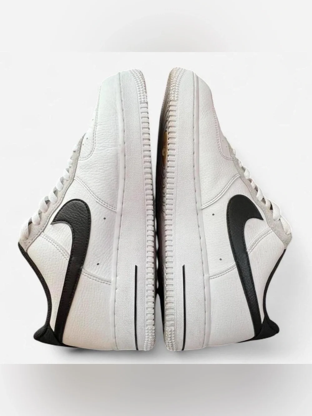 Nike White and Black Leather Sneakers with Gold Accents